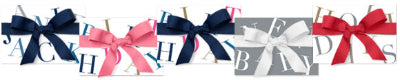 Decorative banner with colorful bows and letters on a white background